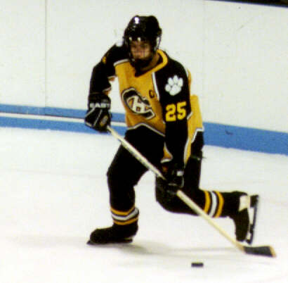 Lee Allen brings the puck out of the corner.