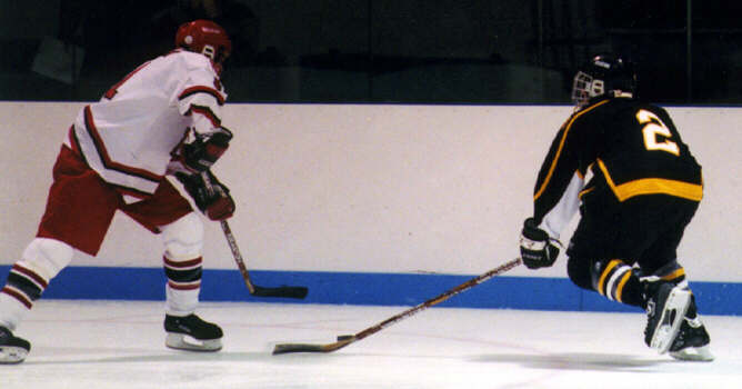 Brendon Benner forechecks against Shaker Heights.