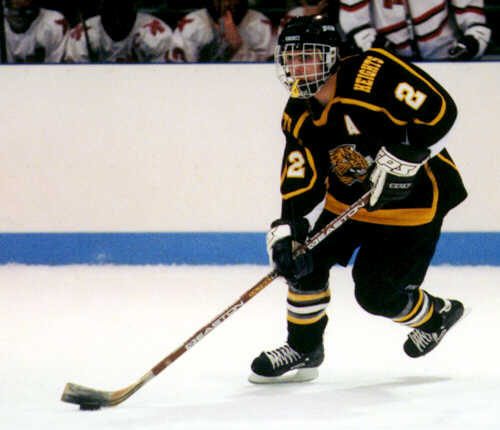 Brendon Benner controls the puck for the Tigers.