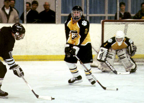 Brendon Benner steps in front of a University shot.