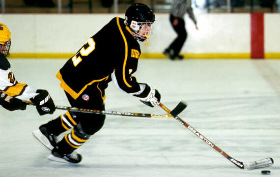 Brendon Benner sails past a Viking.