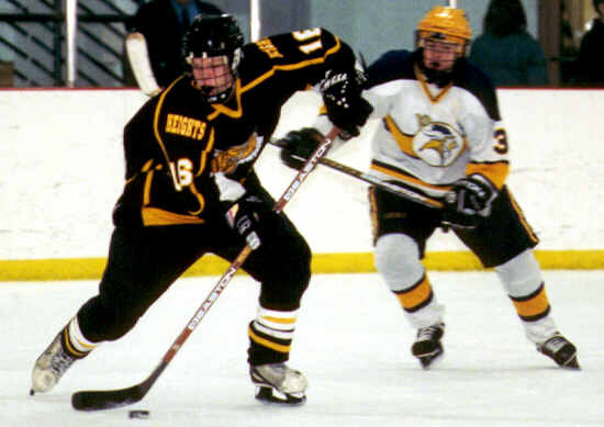 Milton Carter protects the puck.