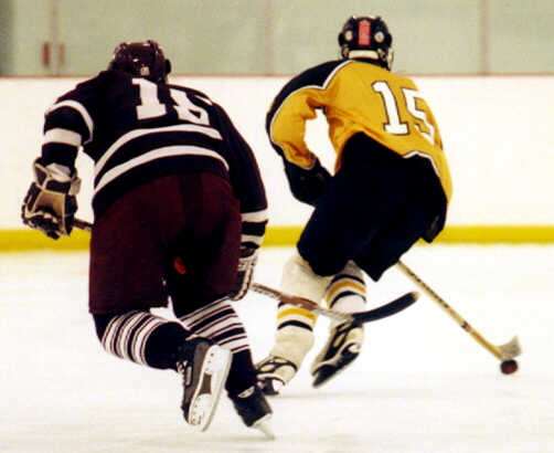 Pat Collins is chased by a Rocky River Pirate.