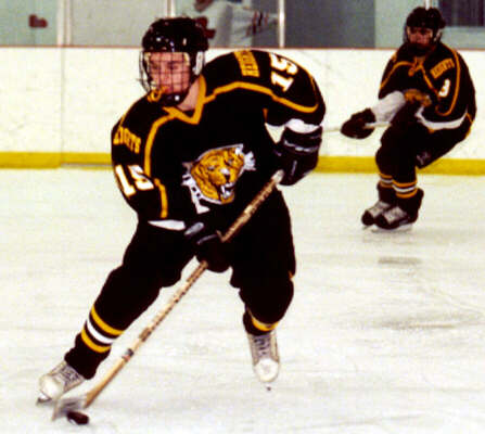 Pat Collins breaks out of the defensive zone.