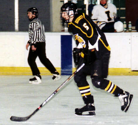 Dan Cross-Call follows the play.