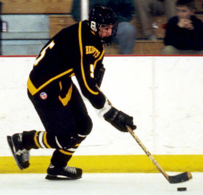 Dan Cross-Call rushes the puck.