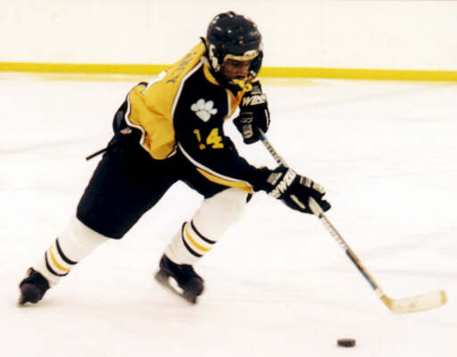 Marcus Dancy handles the puck.