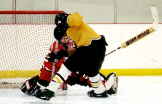 Marcus Dancy challenges Shaker's goaltender.