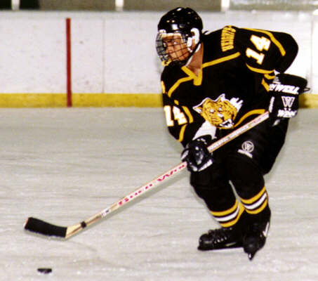 Marcus Dancy looks up ice.