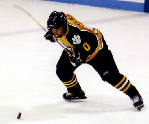 Jeremy Holmes winds up for a slapshot.