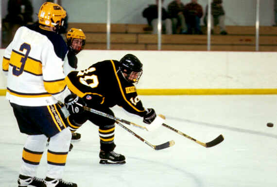 Jeremy Holmes shoots into the offensive zone.