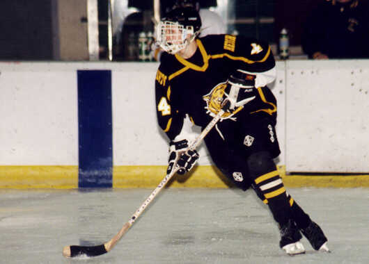 Jeff Houser heads into the offensive zone.