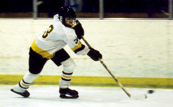 Jared Lavender clears the puck.