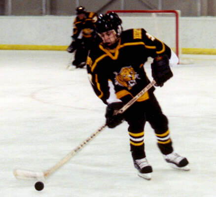 Jared Lavender picks up the puck in the defensive zone.