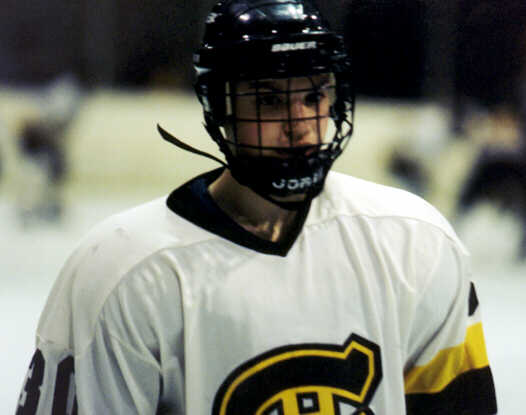 Chris Pesek comes to the bench after a shift against St. Ignatius.