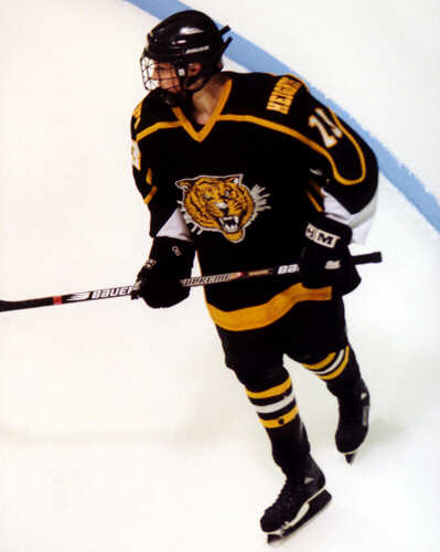 Chris Pesek skates against Shaker.