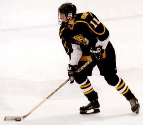 Joe Ross handles the puck.