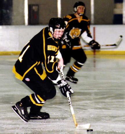 Joe Ross carries the puck out of the Tigers' zone.