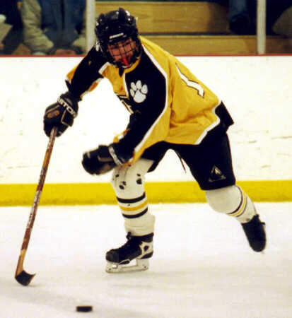 Greg Uguccini goes after a loose puck.