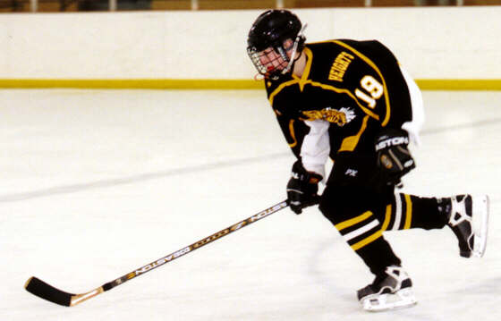 Greg Uguccini hurries to backcheck.