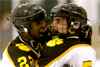 Chris Matthews and Nate Hall celebrate after the two connected for a goal against Hudson.