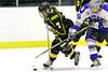 Alex Kraus shields the puck.