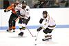 Jordan Shoger and Brad Shoger take control in the defensive zone.