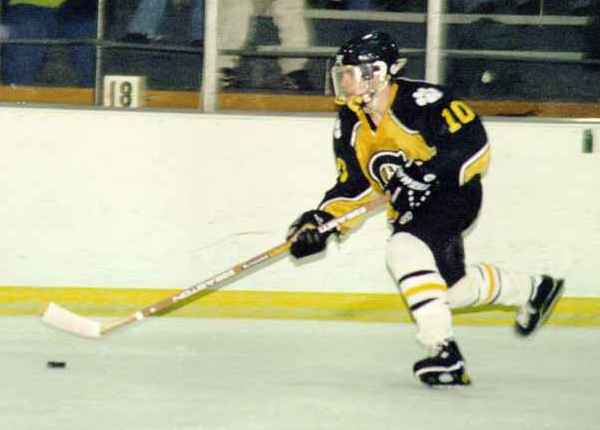 Doug Turner rushes the puck up ice