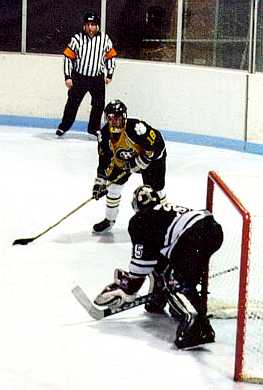 Jake Pollock prepares to score against a poorly coached University goaltender