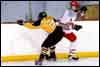 Lee Allen finishes a check against Mentor.