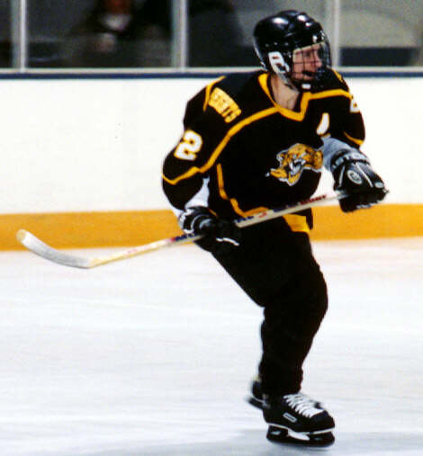 Eric Aber glides down the ice.