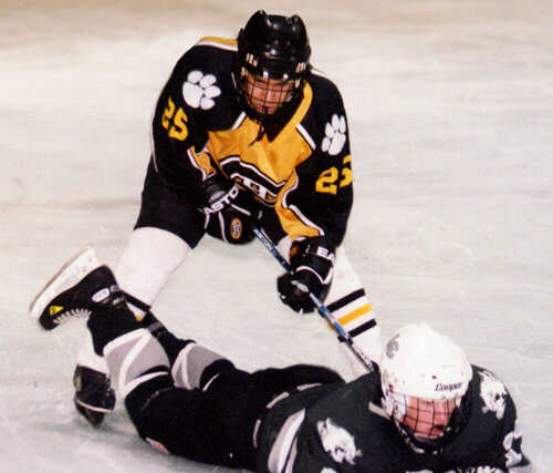 Lee Allen flattens a Lake Catholic Cougar from behind.