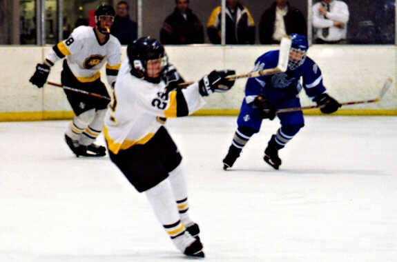 Brian Clark gets the puck outta there.