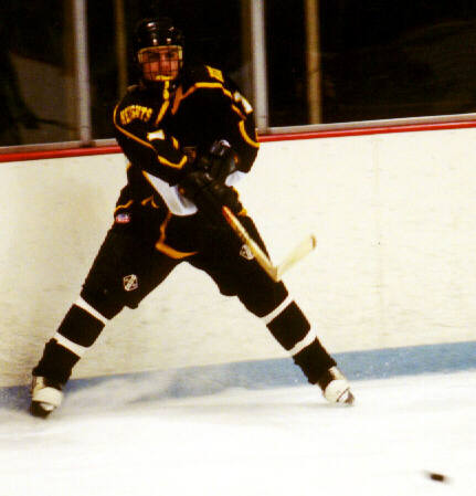 Brendon Benner passes the puck out of the corner.