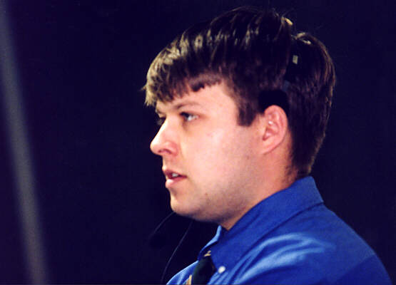 Assistant Coach Dave Boehm watches the Tigers take on Trinity.