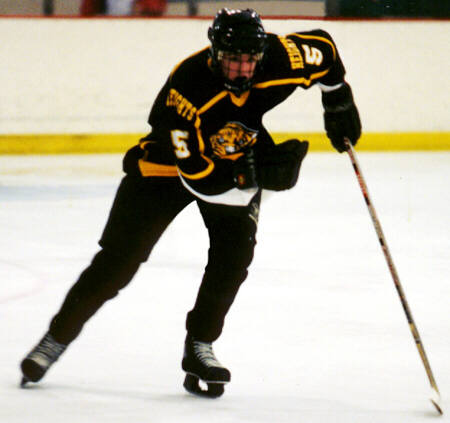 Dan Cross-Call hustles down the ice against Rocky River.