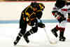 Dan Cross-Call races toward the puck.