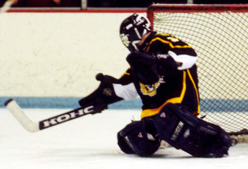 Matt Crowell staves off a shot from Kent Roosevelt.