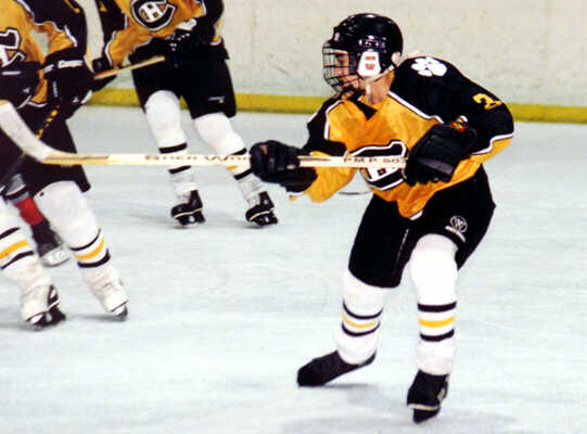 Jared Lavender moves the puck out of the zone.