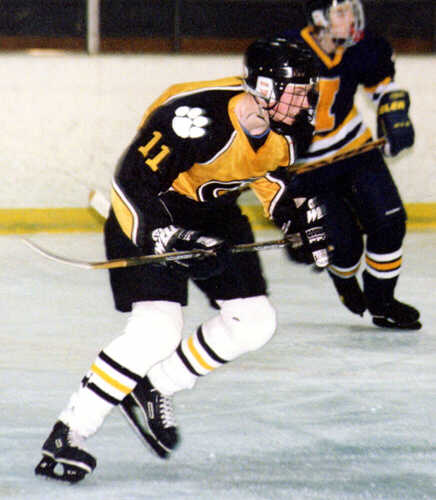 Joe Ross stalks the puck.
