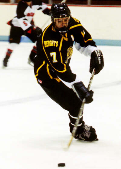 Sean Clark gathers a loose puck.