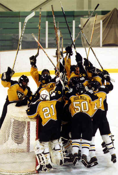 The Tigers huddle before playing North Olmsted.