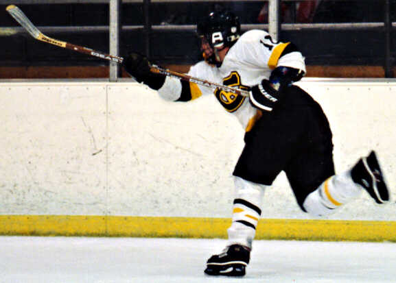 Doug Turner uncorks a powerful slapshot.